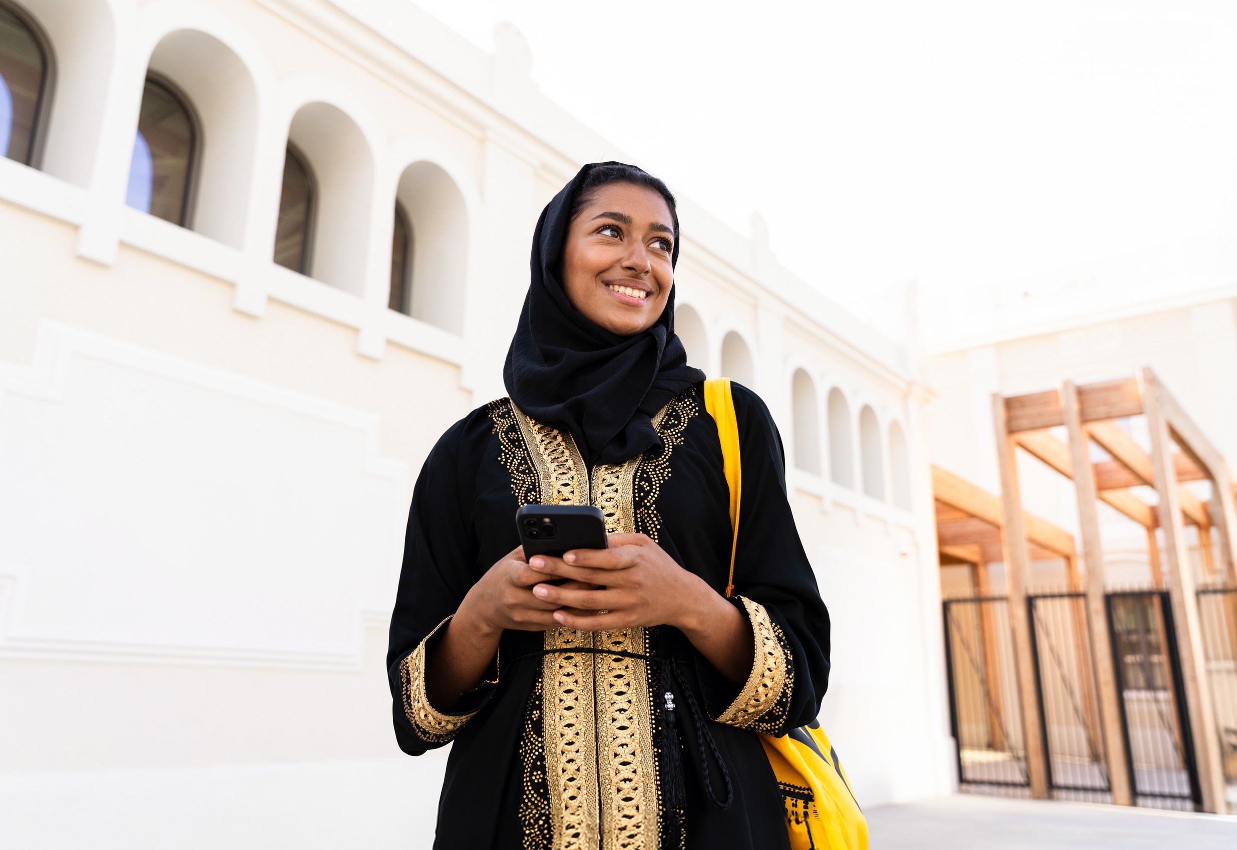 A Woman In Qatar Wearing Traditional Dress